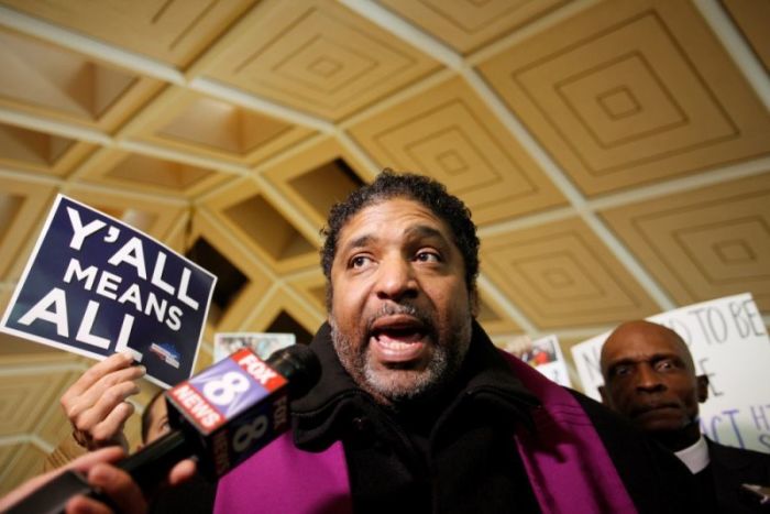 Civil rights leader Reverend William Barber, president of the NAACP in North Carolina, speaks to the media inside the state's Legislative Building as lawmakers gather to consider repealing the controversial HB2 law limiting bathroom access for transgender people in Raleigh, North Carolina, U.S. on December 21, 2016.