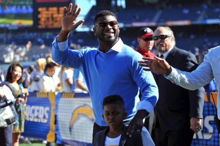 Former San Diego Chargers running back Ladainian Tomlinson waves to the fans before the game against the Kansas City Chiefs at Qualcomm Stadium in San Diego, California on Nov 22, 2015.