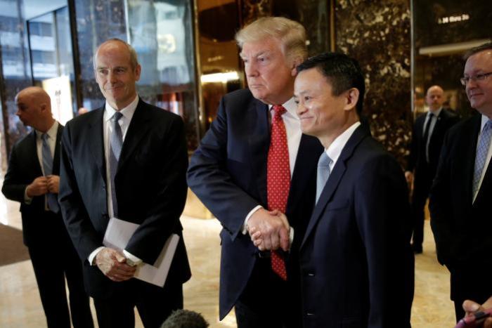 U.S. President-elect Donald Trump shakes hands with and Alibaba executive chairman Jack Ma after their meeting at Trump Tower in New York, U.S., January 9, 2017.