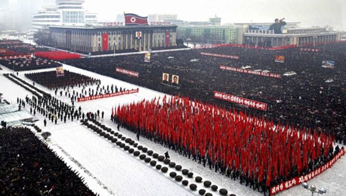 North Koreans attend a mass rally at Kim Il-Sung square in Pyongyang.
