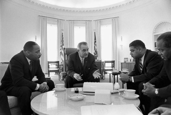 President Lyndon B. Johnson meets with Civil Rights leaders Martin Luther King, Jr., Whitney Young, James Farmer in the White House on January 18, 1964.