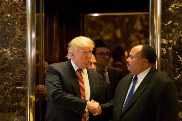 Donald Trump shakes hands with Martin Luther King III after their meeting on MLK Day in Trump Tower, New York on January 16, 2016.