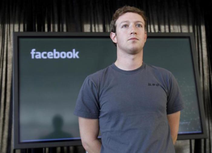 File: Facebook CEO Mark Zuckerberg listens to a question from the audience after unveiling a new messaging system during a news conference in San Francisco, California November 15, 2010.