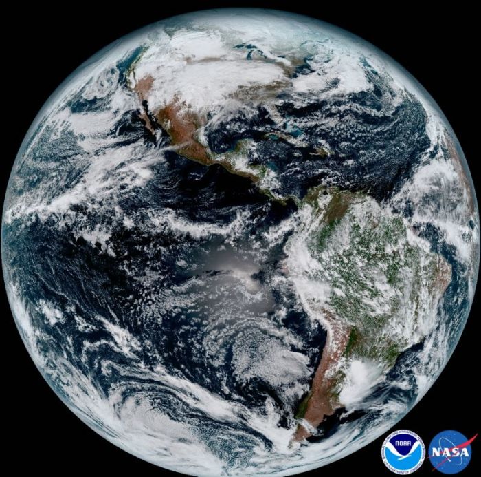 A composite image of Earth taken at 1:07 p.m. ET on Jan. 15 by the GOES-16 satellite.