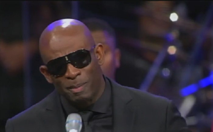 An emotional NFL Hall of Famer Deion Sanders gives a tribute at the homegoing service of the late Bishop Eddie Long on January 25, 2017.