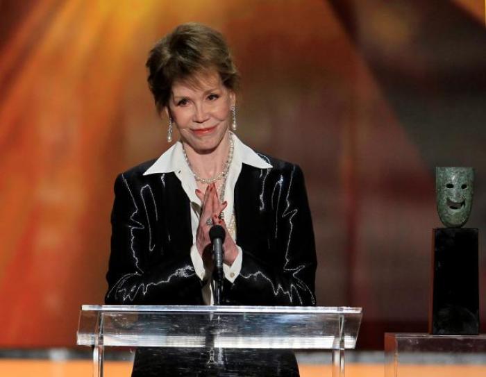 Actress Mary Tyler Moore accepts the Lifetime Achievement Award at the 18th annual Screen Actors Guild Awards in Los Angeles, California, on January 29, 2012.