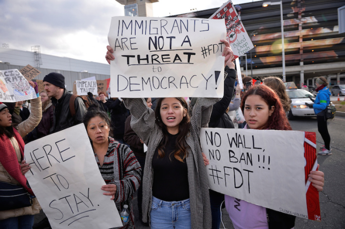Demonstrators yell slogans during anti-Donald Trump travel ban protests outside Philadelphia International Airport in Philadelphia, Pennsylvania, U.S., January 29, 2017.