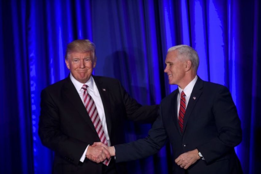 (L-R) U.S. President Donald J. Trump and Vice President Mike Pence greet one another on stage during the 2017 "Congress of Tomorrow" Joint Republican Issues Conference in Philadelphia, Pennsylvania, U.S. January 26, 2017.