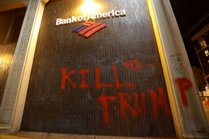 A vandalized Bank of America office is seen after a student protest turned violent at UC Berkeley during a demonstration over gay conservative journalist Milo Yiannopoulos, editor of Breitbart, who was forced to cancel his talk, in Berkeley, California, February 1, 2017.