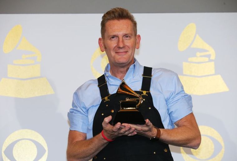 Rory Lee Feek of the country duo Joey Rory holds the award for Best Roots Gospel Album for 'Hymns' during the 59th Annual Grammy Awards in Los Angeles, California, February 12, 2017.