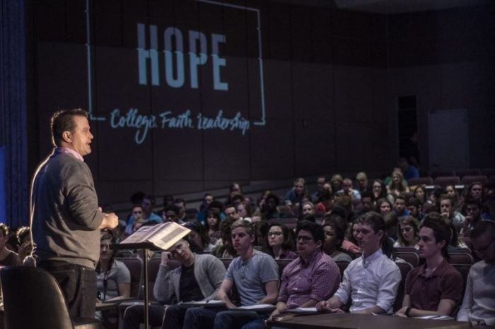 Pastor Brian Smith (podium) speaks with followers at Hope Church on the Tempe campus of Arizona State University.
