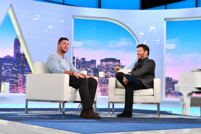 Tim Tebow (left) and Harry Connick Jr. on the daytime talk show 'Harry.'