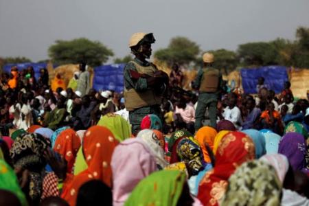 Displaced people attend the speach of Niger's Interior Minister Mohamed Bazoum in a camp of the city of Diffa following attacks by Boko Haram fighters in the region of Diffa, Niger June 18,2016.