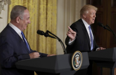 U.S. President Donald Trump (Right) laughs with Israeli Prime Minister Benjamin Netanyahu (Left) at a joint news conference at the White House in Washington, U.S., February 15, 2017.