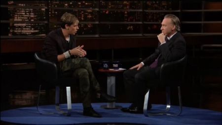 Milo Yiannopoulos (L) speaking with Bill Maher on HBO's