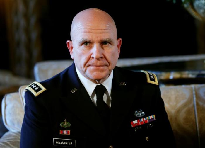 Newly named National Security Adviser Army Lt. Gen. H.R. McMaster listens as U.S. President Donald Trump makes the announcement at his Mar-a-Lago estate in Palm Beach, Florida U.S. February 20, 2017.