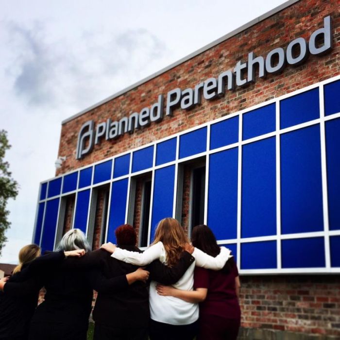 Women stand in front of Planned Parenthood Gulf Coast in Texas.