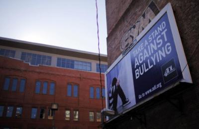 An anti-bullying billboard hangs on a building in downtown Boston, Massachusetts March 3, 2011.