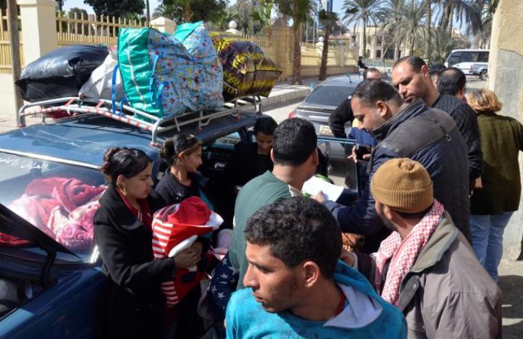 Christian families who left from Al-Arish in the North Sinai Governorate after the escalation of a campaign targeting Christians by Islamic State militants last week, arrive at the Evangelical Church in Ismailia, Egypt, February 24, 2017.