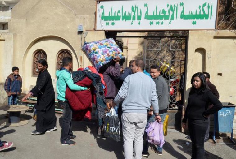 Christian families who left from Al-Arish in the North Sinai Governorate after the escalation of a campaign targeting Christians by Islamic State militants last week, arrive at the Evangelical Church in Ismailia, Egypt, February 24, 2017.