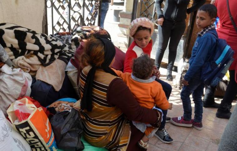 Christian families who left from Al-Arish in the North Sinai Governorate after the escalation of a campaign targeting Christians by Islamic State militants last week, arrive at the Evangelical Church in Ismailia, Egypt, February 24, 2017.