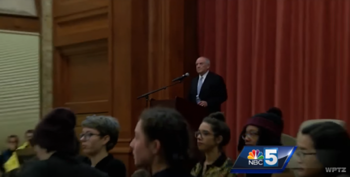 Protesters turn their back on controversial scholar Charles Murray at a speech at Middlebury College in Vermont in March 2017.