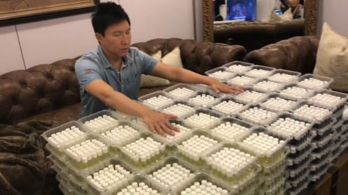 Kong Hee prays for the anointing of God to come into the bottles of olive oil at City Harvest Church in a video posted on March 11, 2017.