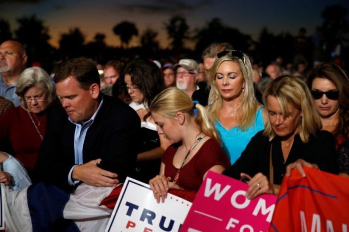 Evangelical supporters of Donald Trump praying at a rally in Florida in this undated photo.