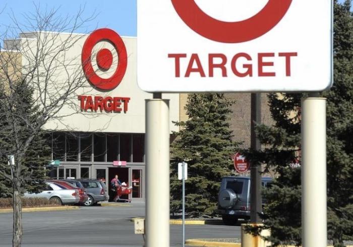 A shopper leaves a Target store, in St Louis Park, Minnesota March 10, 2015.