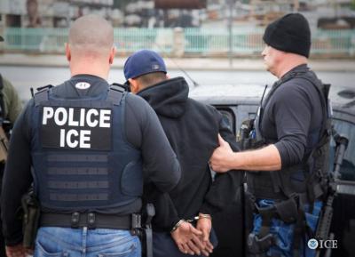 U.S. Immigration and Customs Enforcement officers detain a suspect as they conduct a targeted enforcement operation in Los Angeles, California, U.S. on February 7, 2017. 