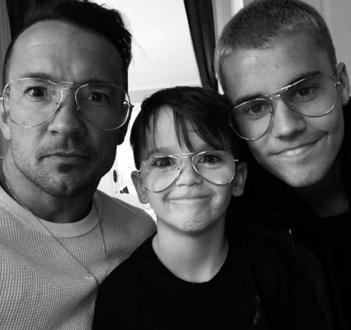 Hillsong NYC Pastor Carl Lentz poses in a photo with his son, Roman, and Justin Bieber, March 29, 2017.