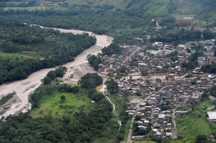 An aerial view shows a flooded area after heavy rains caused several rivers to overflow, pushing sediment and rocks into buildings and roads in Mocoa, Colombia, April 1, 2017.