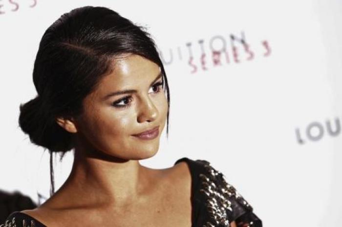 Actress Selena Gomez arrives for the 'Louis Vuitton Series 3' Exhibition gala opening in London, Britain.
