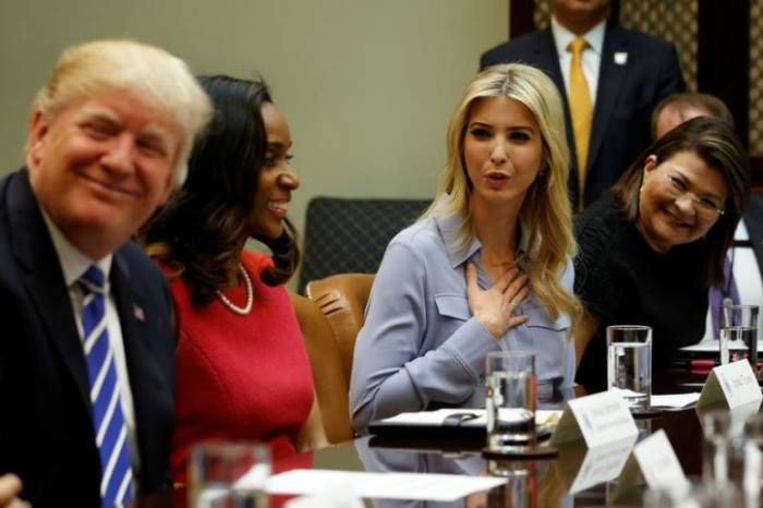 Ivanka Trump (2nd R) joins her father U.S. President Donald Trump (L) as he meets with women small business owners at the White House in Washington, U.S. March 27, 2017.