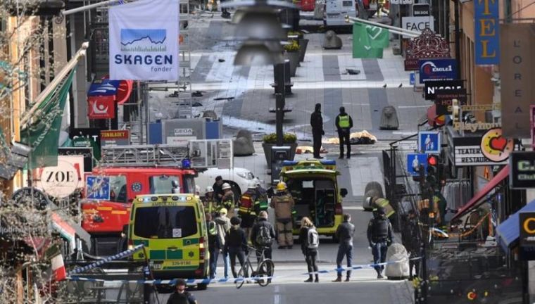 A view of the street where at least four people were killed and several injured when a truck crashed into department store Ahlens, in central Stockholm, April 7, 2017.