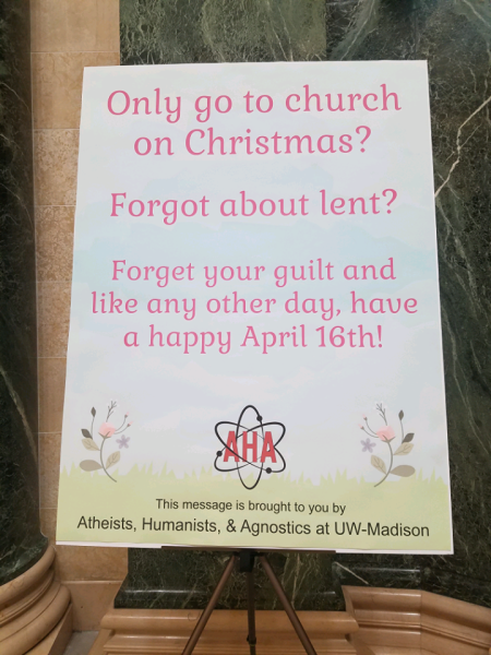 Atheists, Humanists, & Agnostics at UW-Madison "forget your guilt" Easter poster displayed at the state capitol on April 10, 2017.