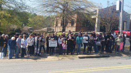 Pro-life activists pray the "Way of the Cross for Victims of Abortion" outside an abortion clinic in Little Rock, Arkansas.