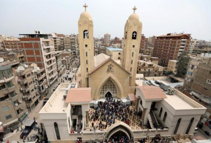 A general view is seen as Egyptians gather by a Coptic church that was bombed on Sunday in Tanta, Egypt, April 9, 2017.