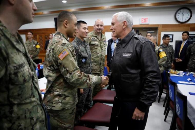 U.S. Vice President Mike Pence shakes hands with U.S. soldier during a meeting with U.S. and South Korean soldiers at Camp Bonifas near the truce village of Panmunjom, in Paju, South Korea, April 17, 2017.