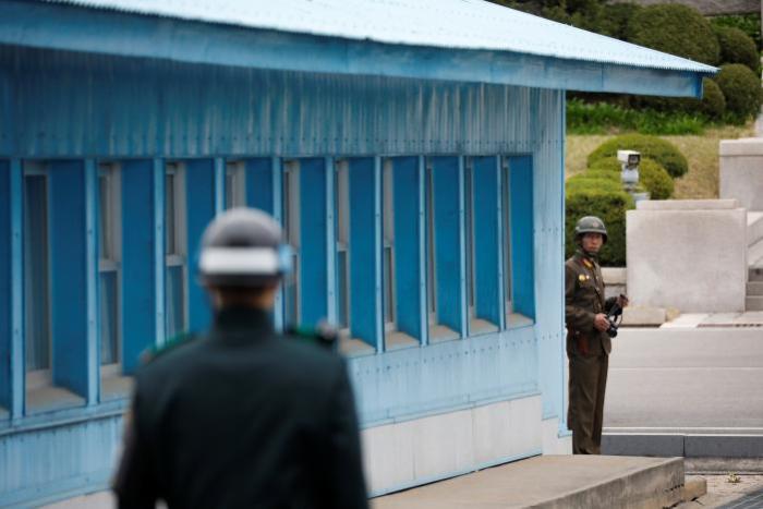 A North Korean soldier keeps watch toward the south as U.S. Vice President Mike Pence (not pictured) arrives at the truce village of Panmunjom, South Korea, April 17, 2017.