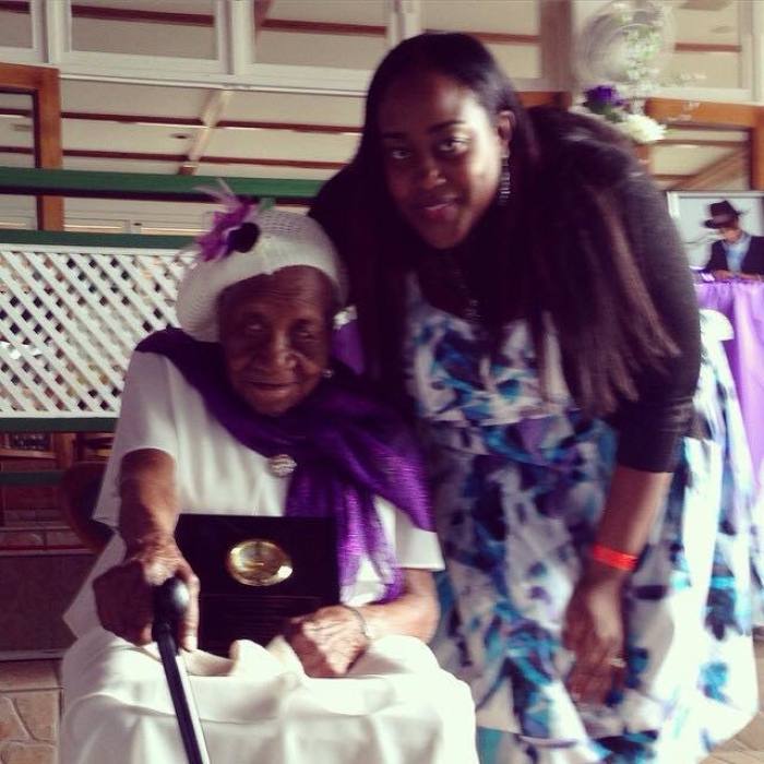 Violet Mosses Brown with her great granddaughter on her 115th Birthday.