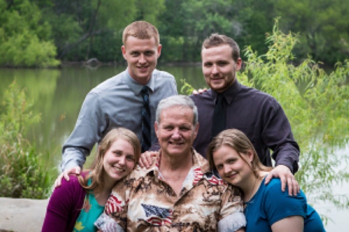 Murray Barrett, 67, and his four children.