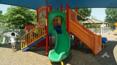 Children play on the playground at the Trinity Lutheran Child Learning Center in Columbia, Missouri.
