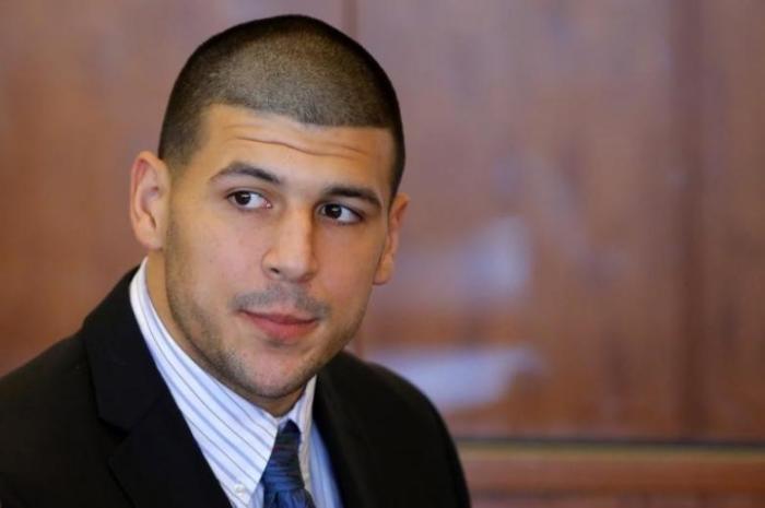 Aaron Hernandez, former player for the NFL's New England Patriots football team, attends a pre-trial hearing at the Bristol County Superior Court in Fall River, Massachusetts October 9, 2013.