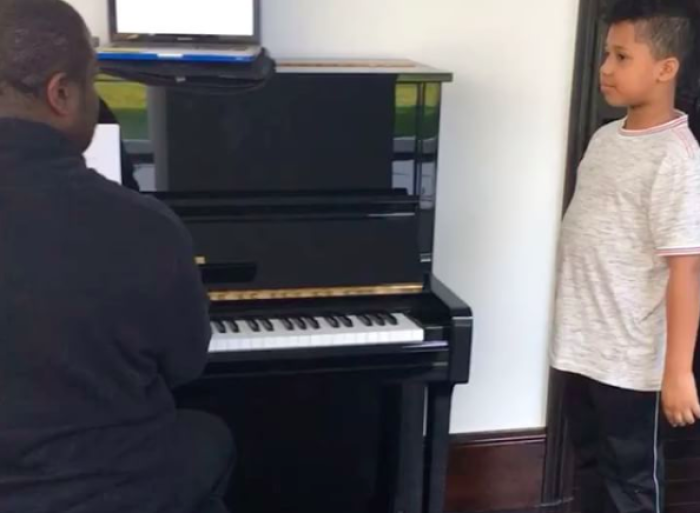 Jennifer Hudson's son David Otunga Jr. sings with his piano teacher.
