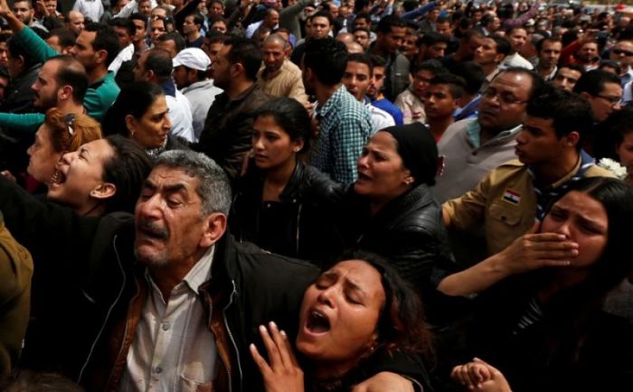Relatives mourn victims of the Palm Sunday bombings during a funeral at the Monastery of Saint Mina in Alexandria, Egypt, on April 10, 2017.