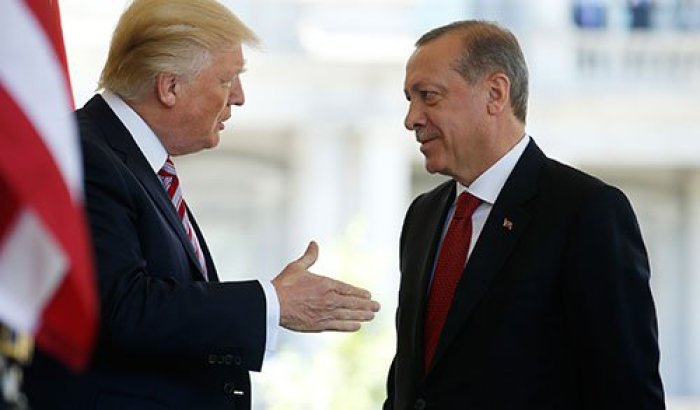U.S President Donald Trump (L) talks with Turkey's President Recep Tayyip Erdogan as he arrives at the entrance to the West Wing of the White House in Washington, U.S. May 16, 2017.