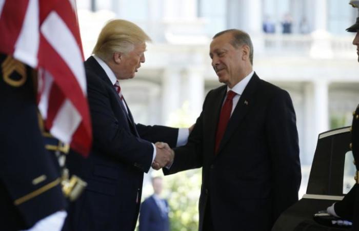 U.S President Donald Trump (L) welcomes Turkey's President Recep Tayyip Erdogan at the entrance to the West Wing of the White House in Washington, U.S. May 16, 2017.