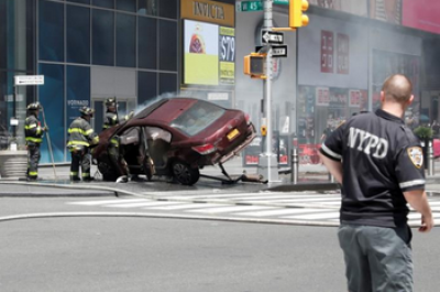 A vehicle that struck pedestrians and later crashed is seen on the sidewalk in New York City, U.S., May 18, 2017.
