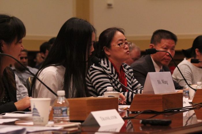 Wang Yanfang, the wife of imprisoned rights lawyer Tang Jingling, speaks during a Congressional hearing in Washington, D.C. on May 18, 2017. The hearing also featured other wives of human rights lawyers imprisoned and tortured in China.